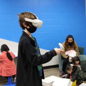 Youth playing an Oculus game